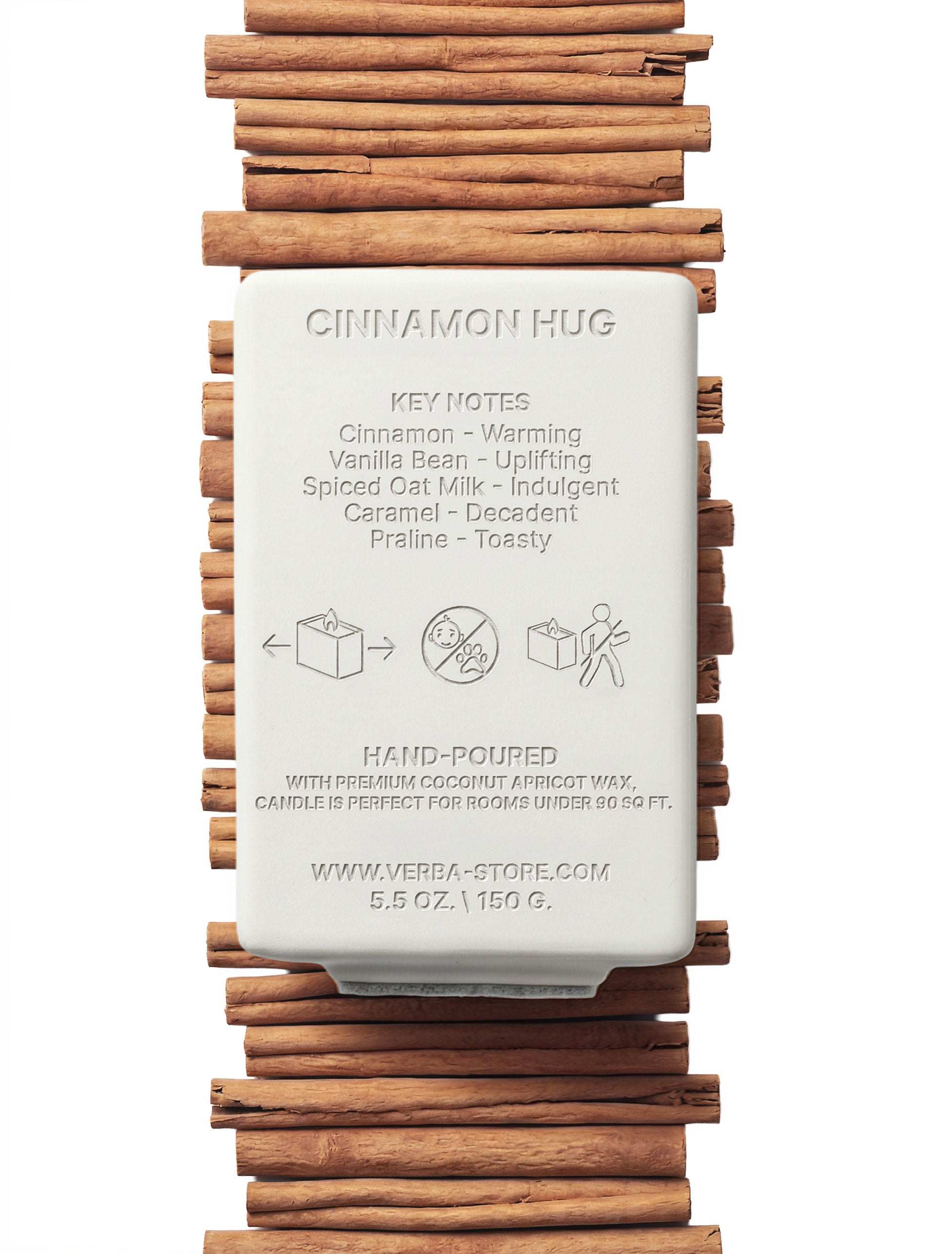 Verba Cinnamon Hug niche scented candle with wooden wick — product photography on warm background
