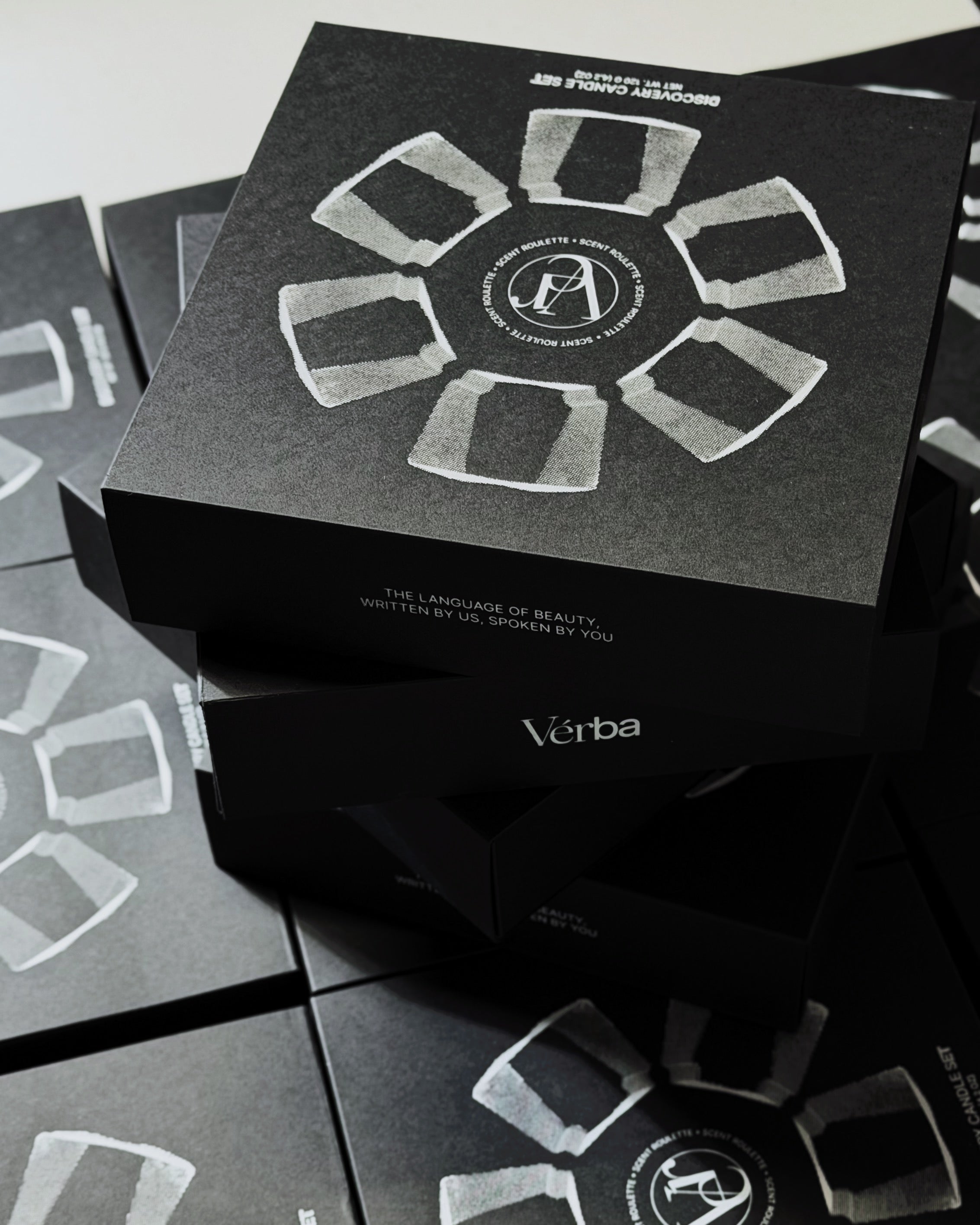 Minimalist black and white candle gift set — Verba Scent Roulette with wooden wicks.
